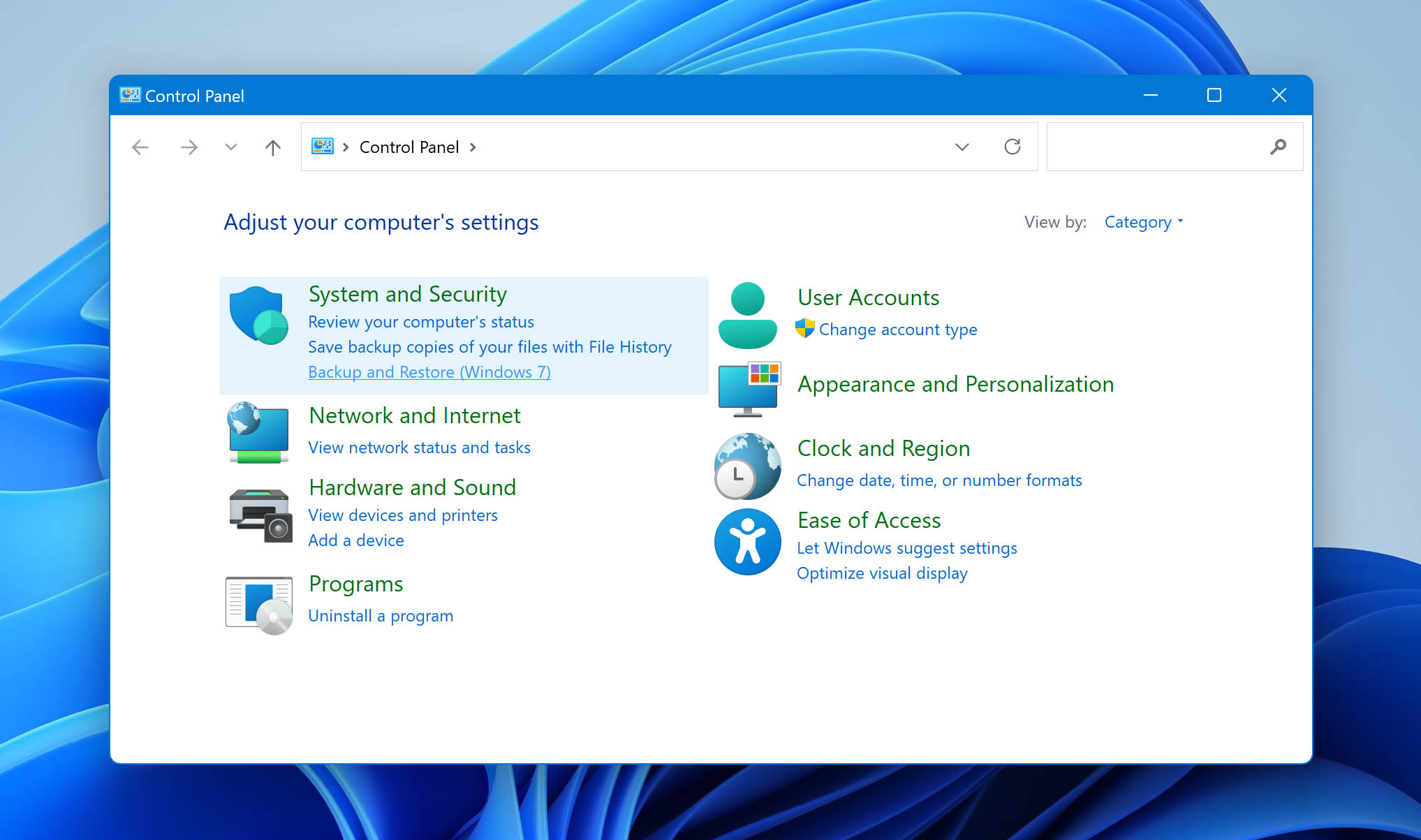 Graphic guide showing how to select Backup and Restore (Windows 7) in the Control Panel on Windows 11