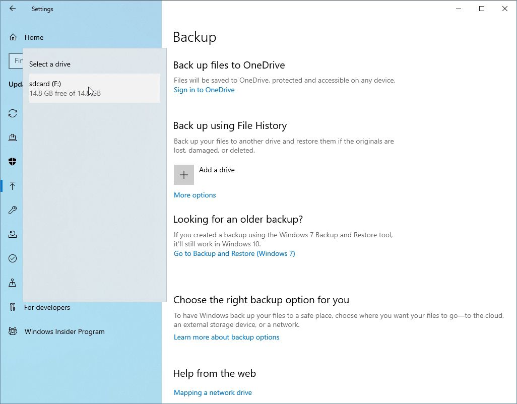 Selecting the drive where Windows 10's File History will store backups.