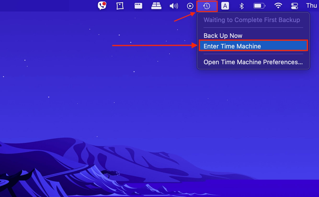 Enter Time Machine button in the Apple menu bar