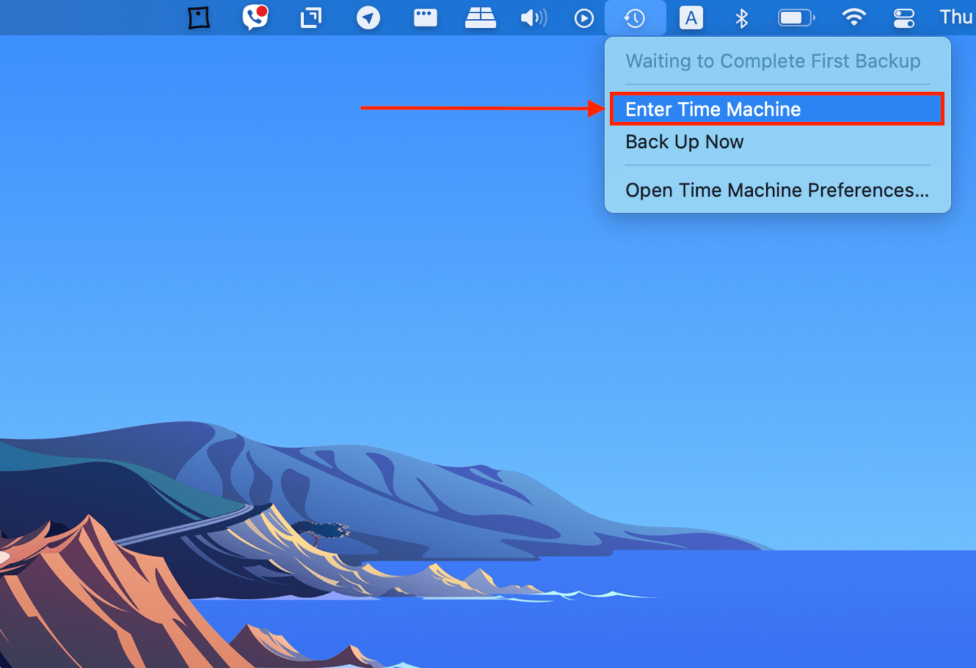 Enter Time Machine button in the Apple menu bar