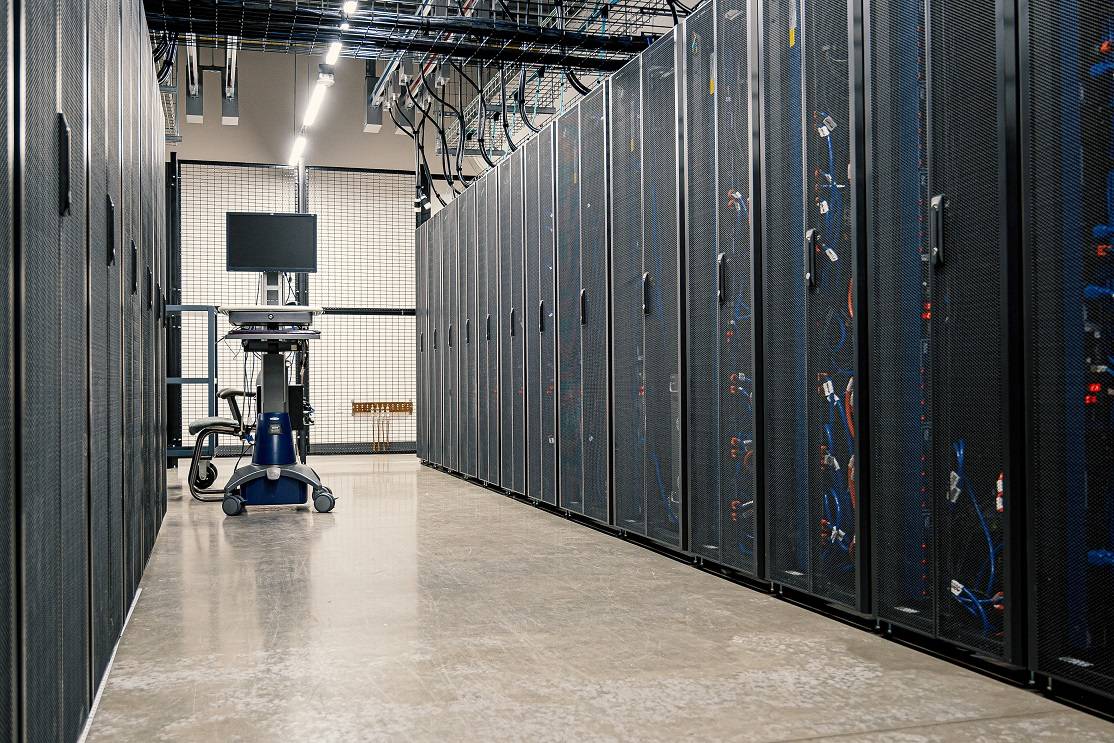 An aisle of server racks.