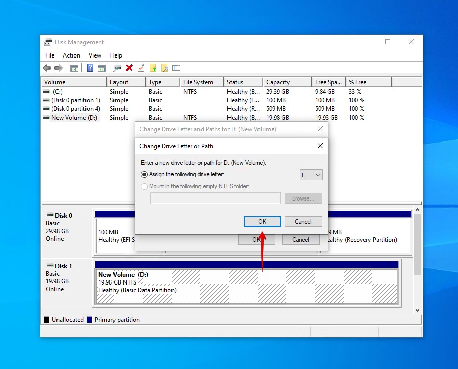 Selecting and confirming a new drive letter.