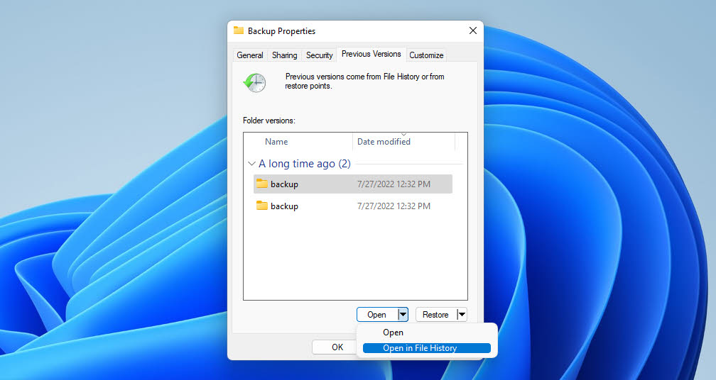 Picture illustrating the action of opening file history backup to recover deleted flash drive files