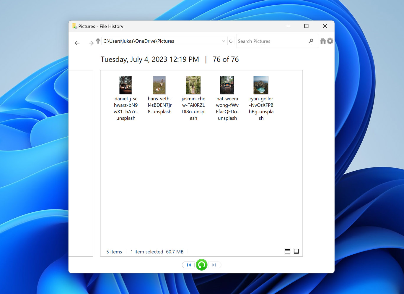 Image of the File History window on Windows 11, a feature to restore deleted photos