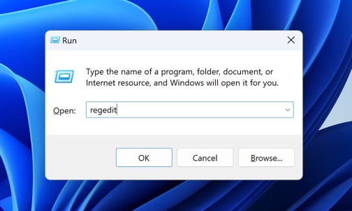 Image showcasing the process of opening the Registry Editor application to restore Recycle Bin on a USB flash drive