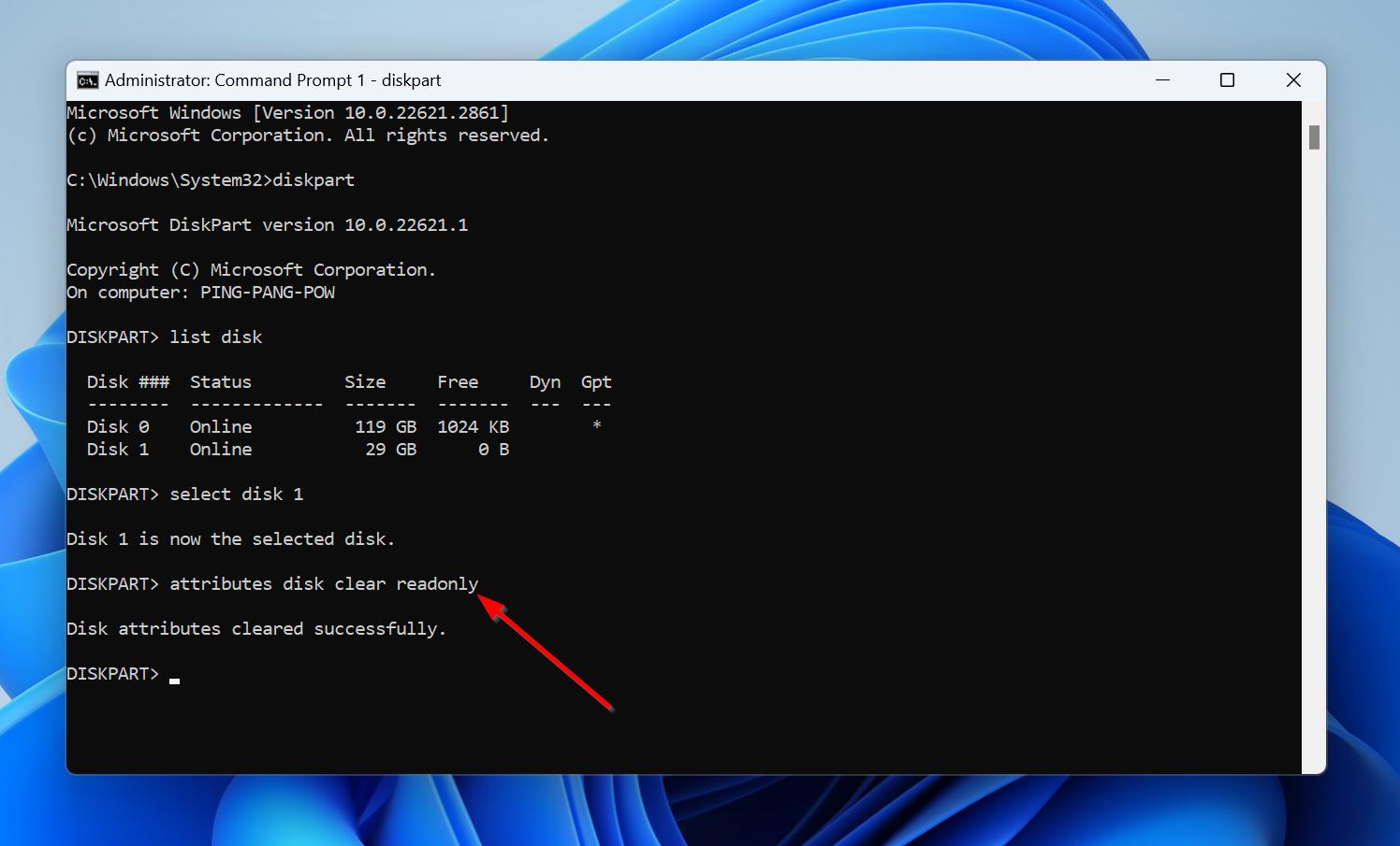 A screenshot of a command prompt window showing DiskPart tool commands. A 'list disk' command has been executed, displaying two disks, followed by a 'select disk 1' command, and 'attributes disk clear readonly' command with a success message.