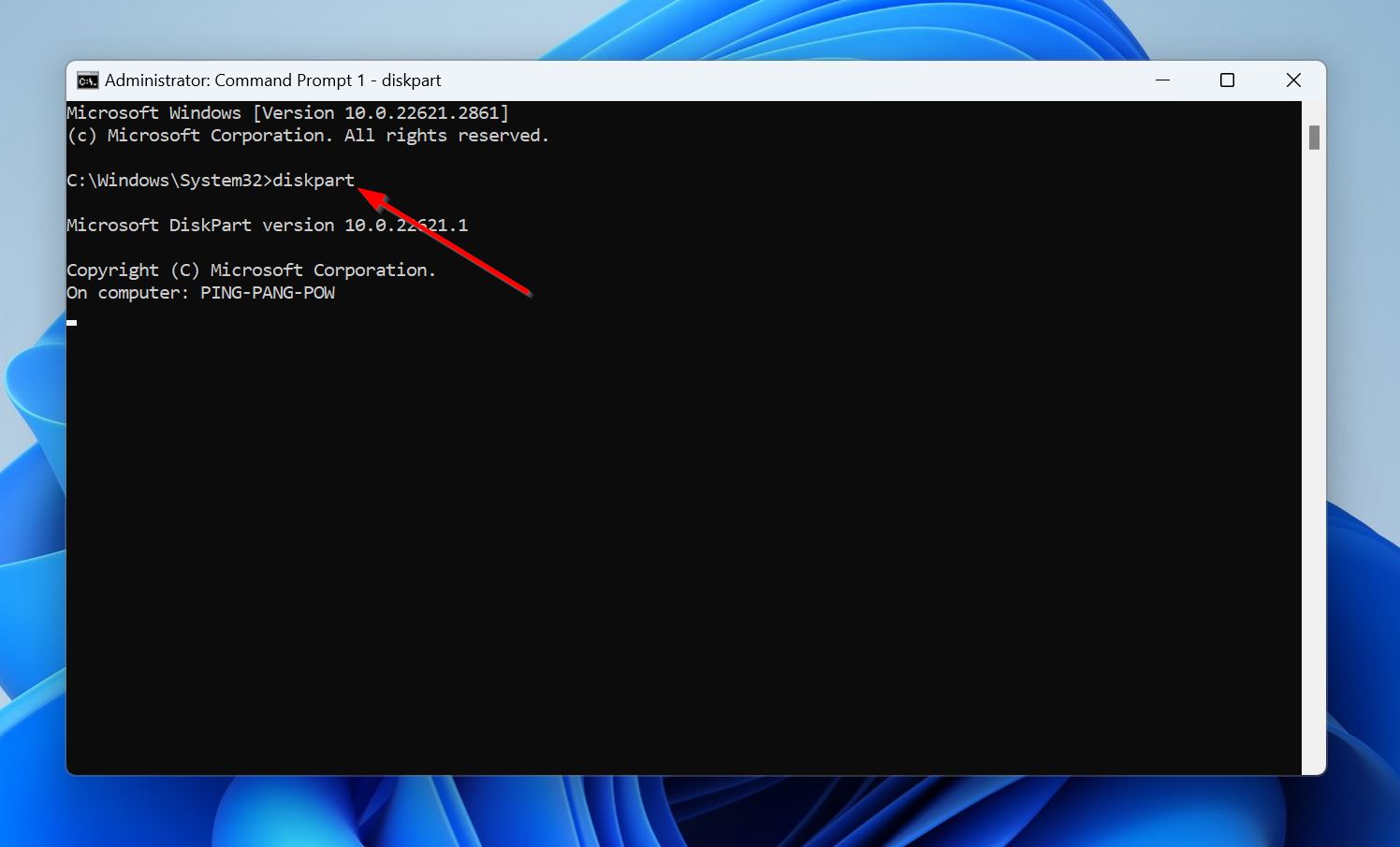 A command prompt window displaying the DiskPart command at the top, with a red arrow pointing to it.