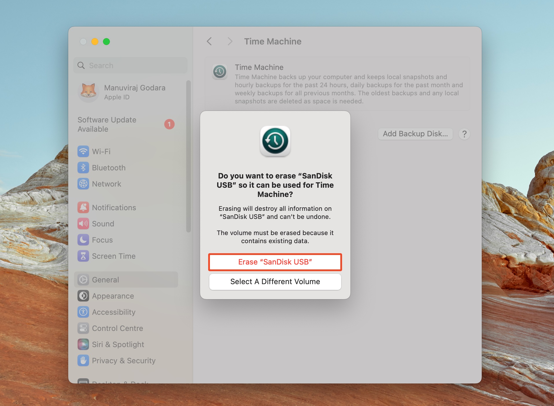 Prompt to erase "SanDisk USB" for use with Time Machine, with options to erase or select a different volume.
