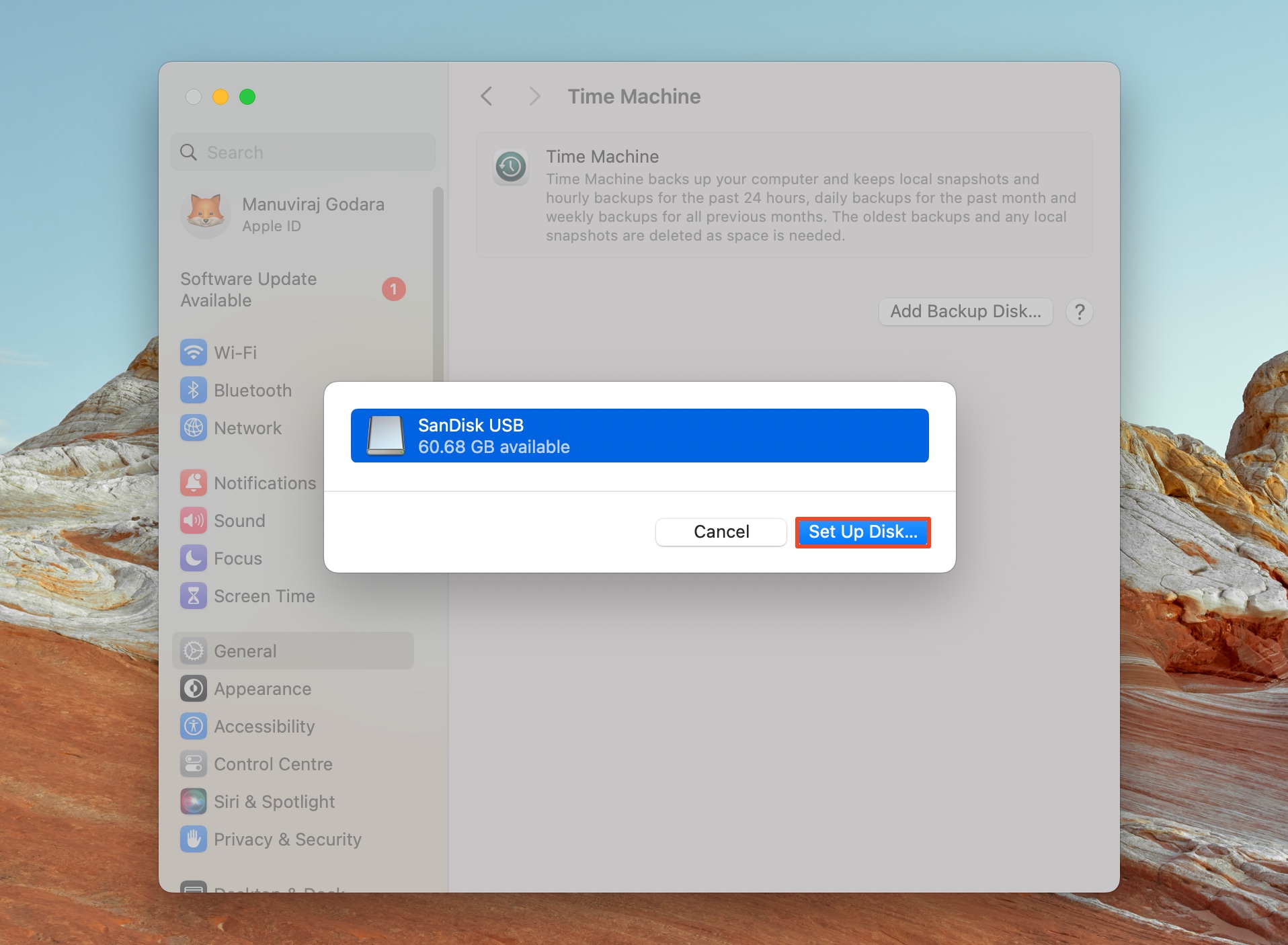 A prompt to confirm setting up the SanDisk USB as the backup disk, displaying available disk space.